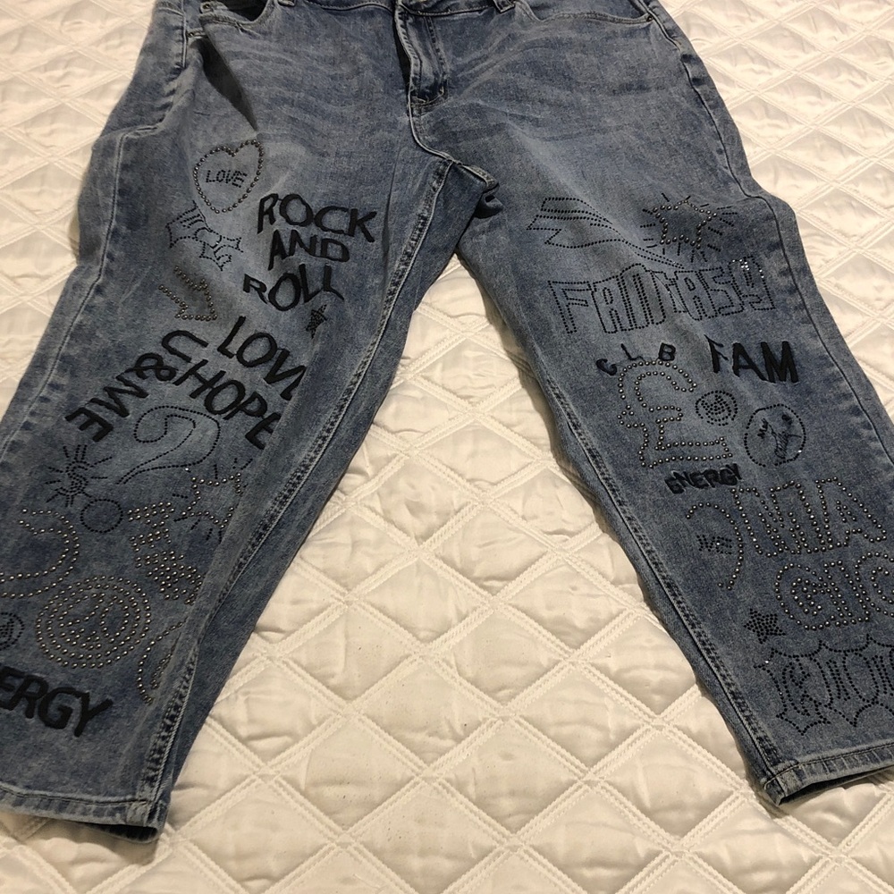 Charlie B faded Blue denim jeans with embroidered text & stud embellishments